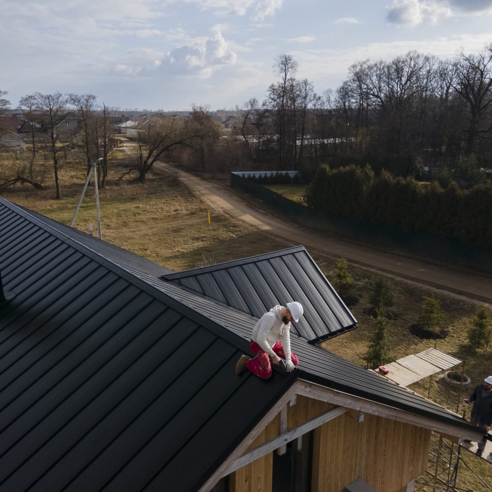 long shot roofer working with helmet